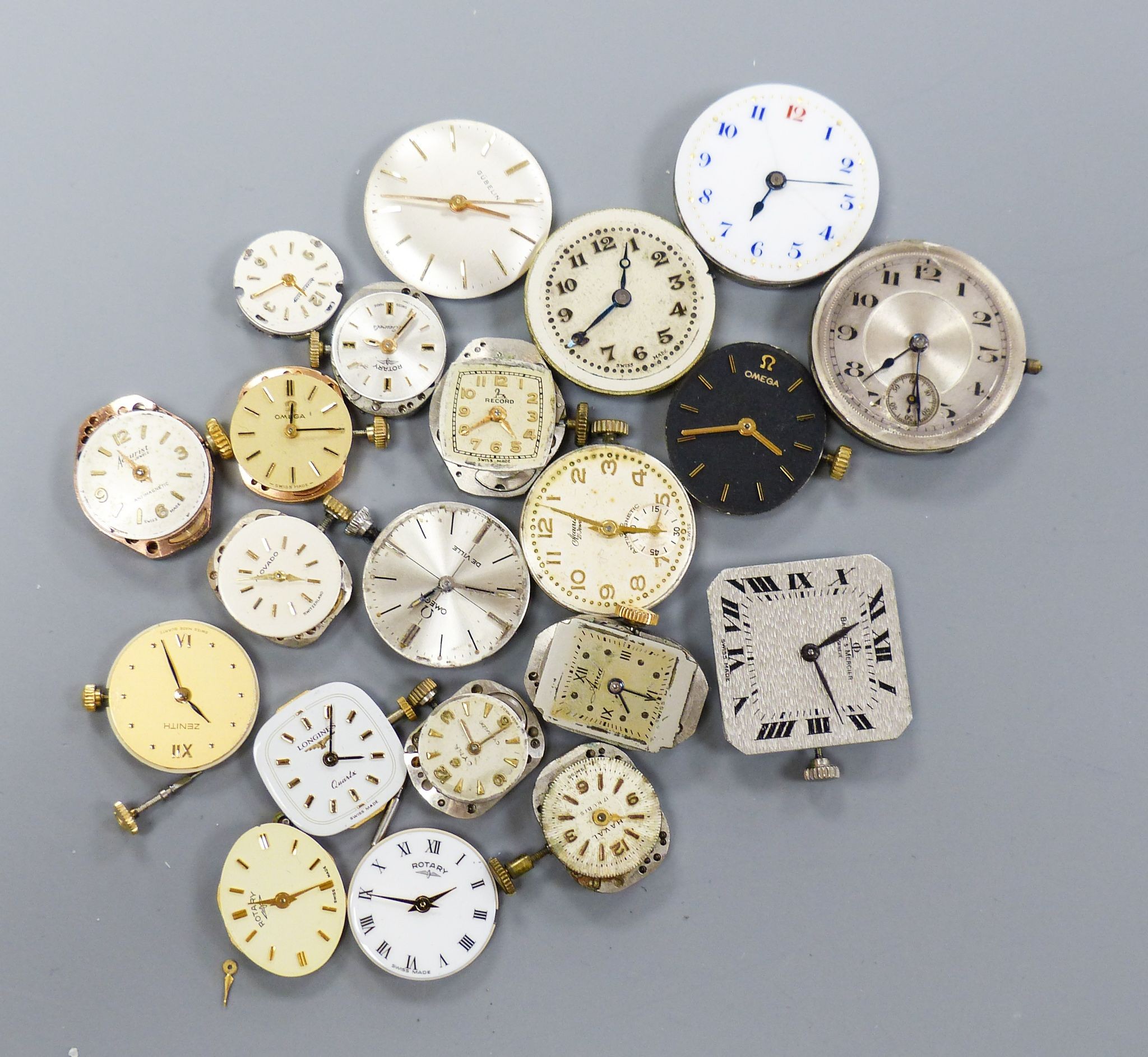 A small quantity of wrist watch movements including Baume & Mercier, Omega and Rotary.